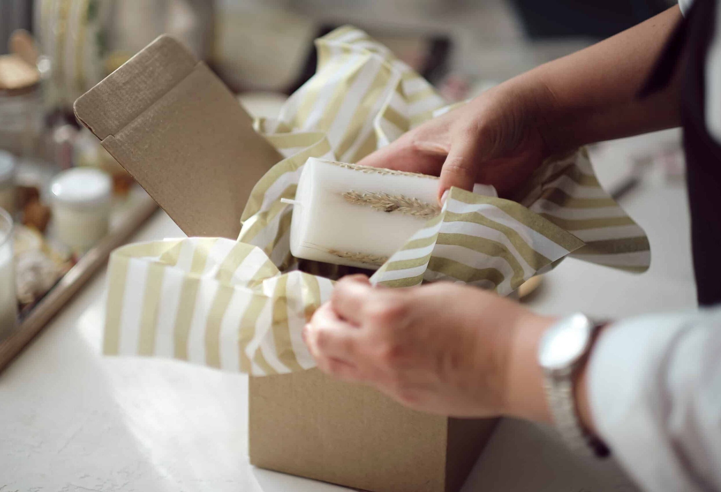 small business owner, online marketing packaging box and delivery. A parcel wrapped in brown paper. Delivery concept for private companies delivery with care. Craft present box